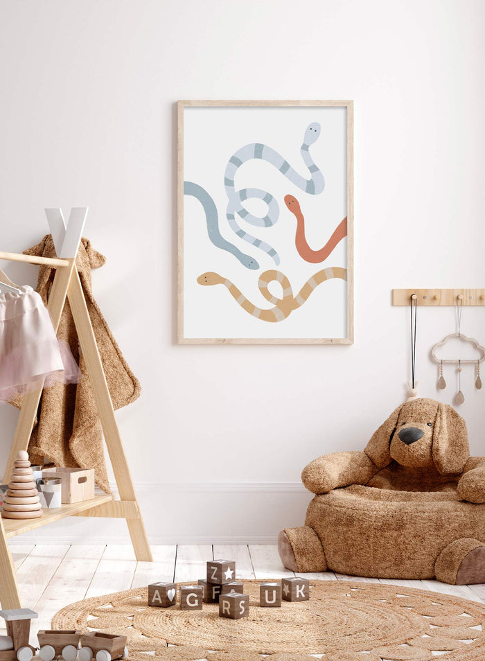 Silly Snakes is a minimalist illustration by Opposite Wall of four colourful snakes, where two are striped, roaming across the poster.