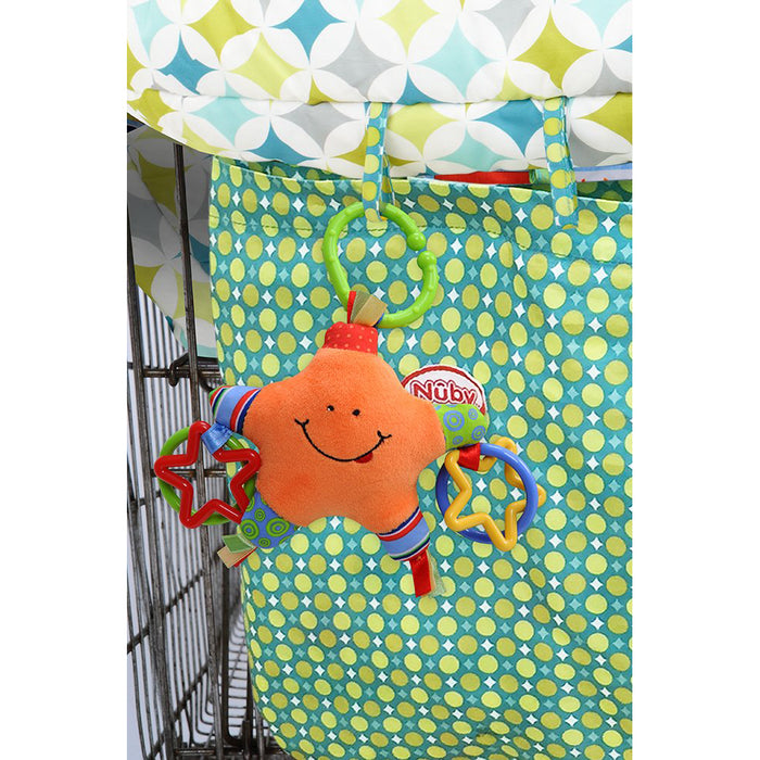 The Nuby 2-in-1 Universal Size Shopping Cart & High Chair Cover features a colorful plush star toy with a smiley face, striped arms, and plastic star rings, hanging from a green ring—perfect for keeping baby entertained on the go.
