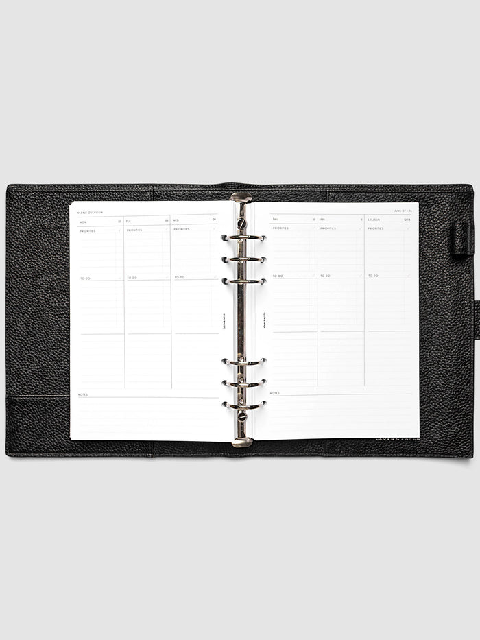 Both pages inside planner: 2027 Dated Weekly Task Planner Inserts, Monday Start, A5 6-Ring Punch, full week-on-two-pages spread showing blank vertical columns for each day with labeled priorities, to-do, and notes sections, Saturday and Sunday combined, and weekly notes section along the bottom, shown inside a planner