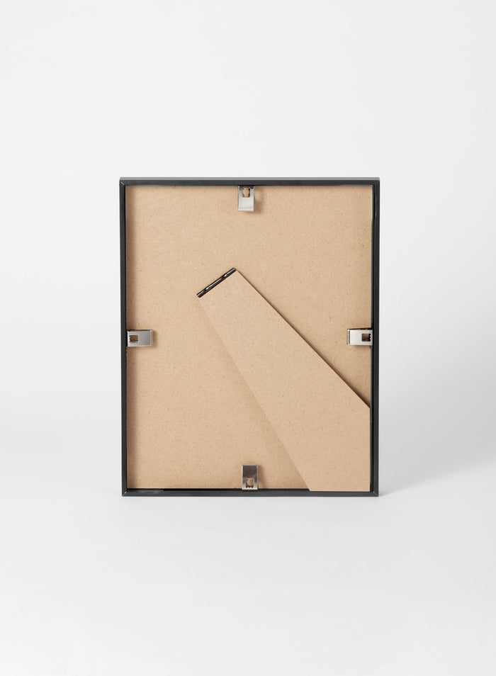 Scandinavian black aluminum metal frame by Opposite Wall - Back of the frame and metal fasteners