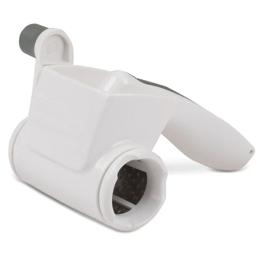 White handheld fod grater device with a cylindrical grater on a white background