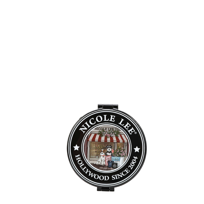 THE BACK OF THE MIRROR HAS THE NICOLE LEE SEAL , IN THE MIDDLE THERE'S 2 SCHNAUZER DOGS IN FRONT OF A COFFEE SHOP.
