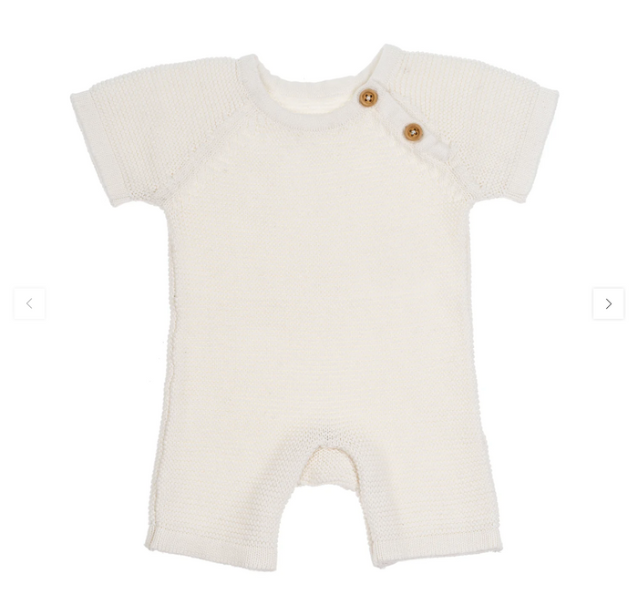 Ivory cotton knit baby onesie with short sleeves and wooden buttons on a white background.