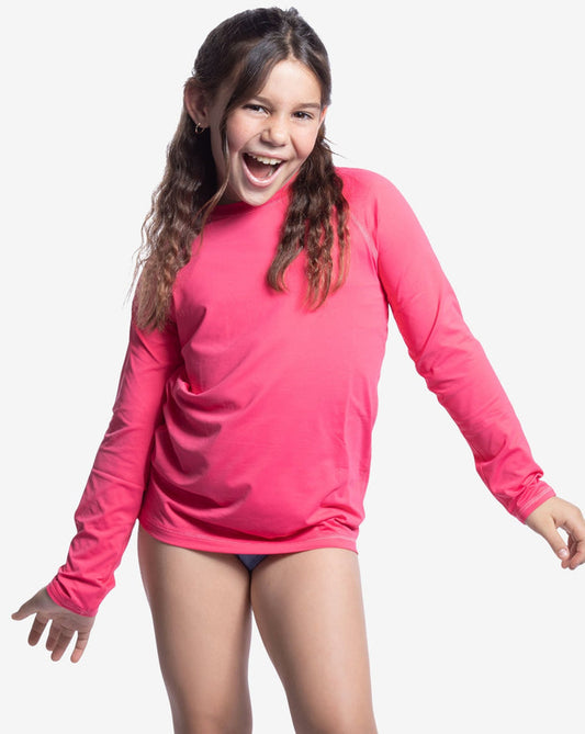 Girl wearing watermelon UPF top over a swimsuit. (Style 1005K) - BloqUV