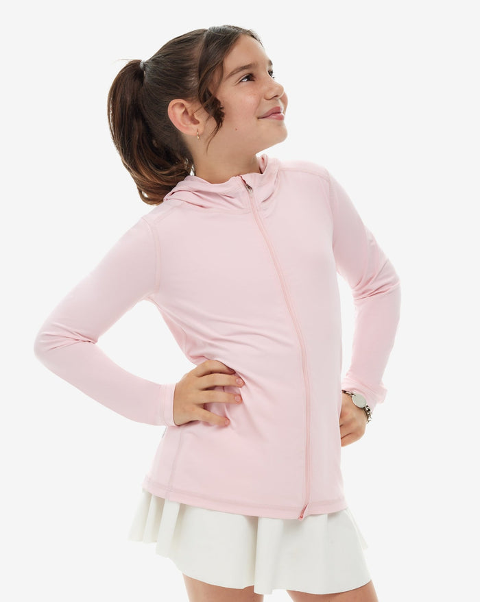 A girl wearing a pink full zip hoodie top with long sleeves, suitable for kids.