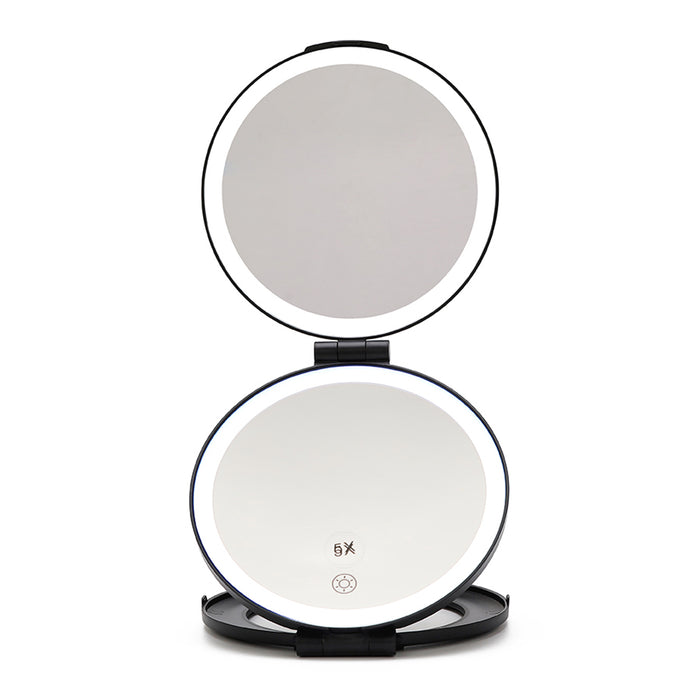 THE MIRROR IS OPEN, HAS DOUBLE MIRROR ,IT HAS LED LIGHTING THAT SURROUNDS EACH MIRROR WITH A SENSOR.