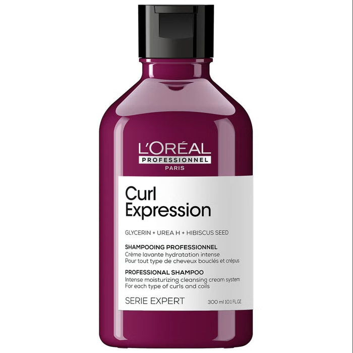 L'Oréal Professionnel Curl Expression Moisturizing Cleansing Cream Shampoo 500ml bottle with label and pump dispenser.