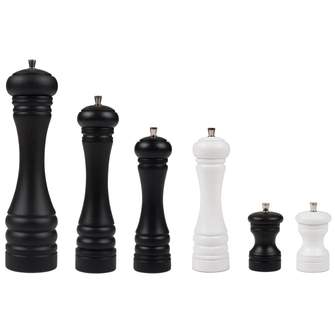 Set of black and white pepper mills on a white background