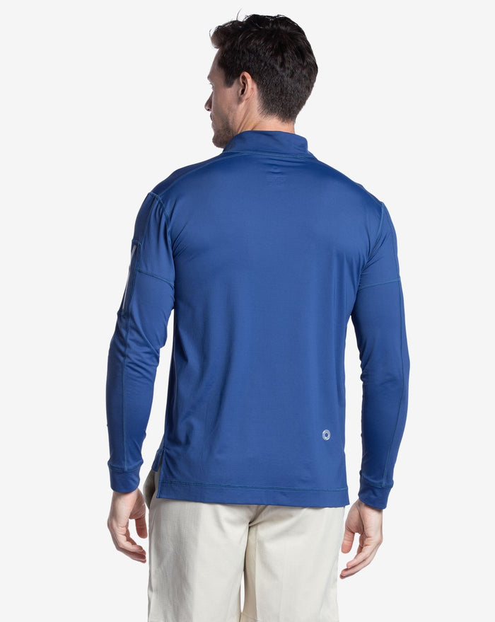Man wearing long sleeve mock zip shirt in navy blue. Back of shirt shown in picture. (Style 12001) - BloqUV