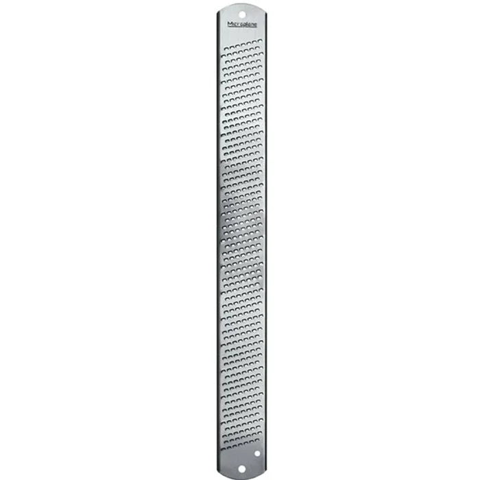 Metal zester on a white background