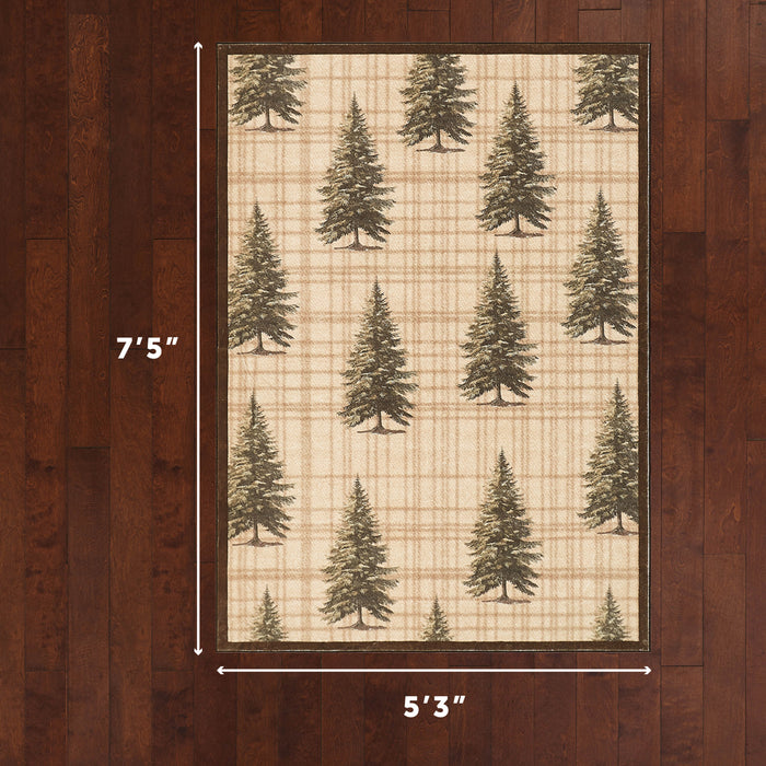 Cream and tan plaid area rug with scattered green pine tree pattern and brown border, 5'3" x 7'5".