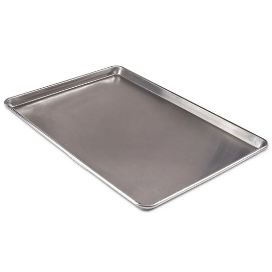 Stainless steel baking tray on a white background