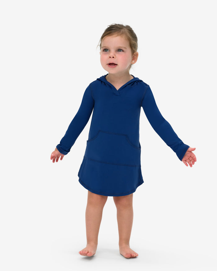 A toddler in a blue hoodie dress with long sleeves and a hood, standing against a white background.
