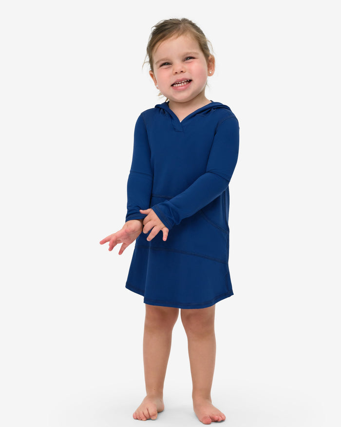 A toddler in a blue hoodie dress with long sleeves and a hood, standing against a white background.