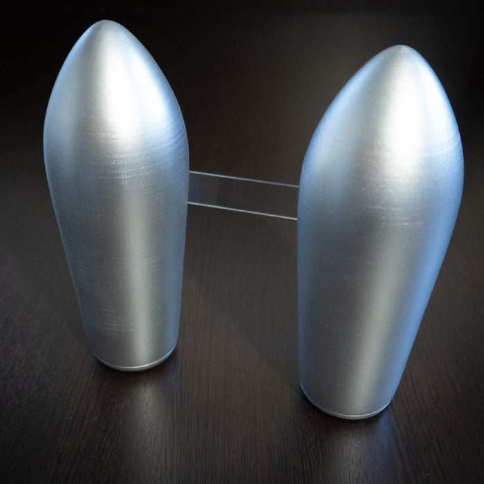 Back view of the silver Ulala backpack prop showing metallic finish