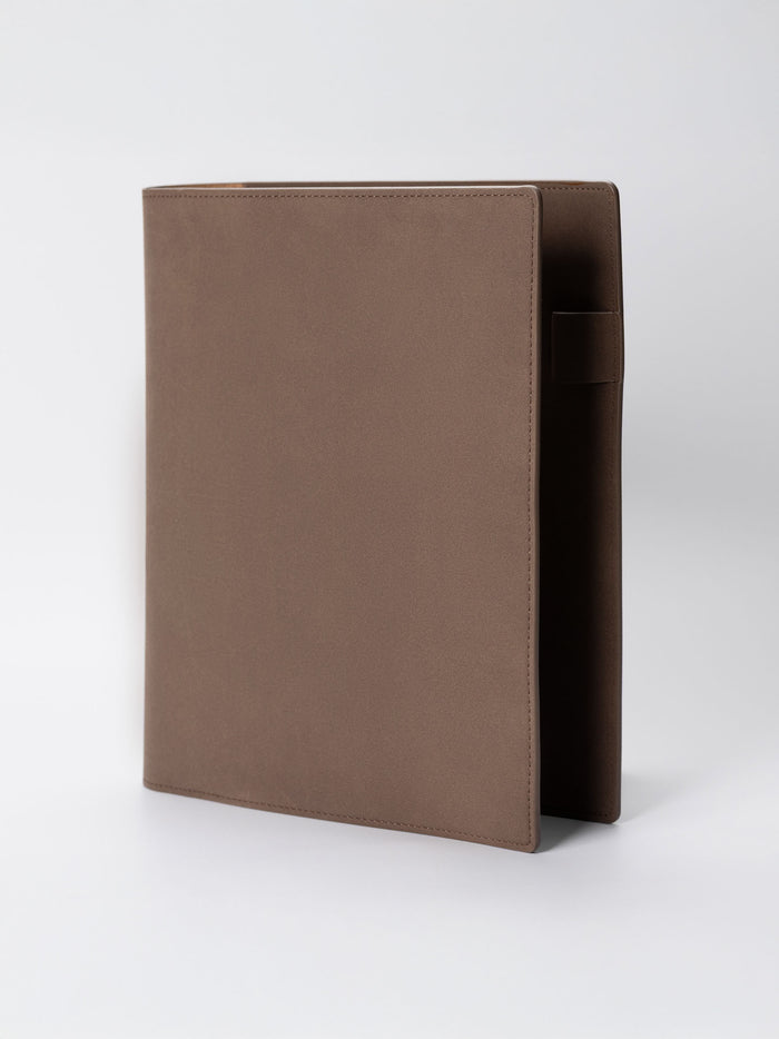 Folio displayed on a neutral background. Color shown is Espresso.