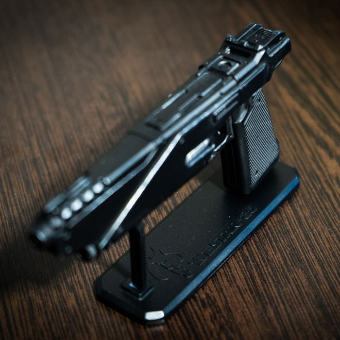 Hand-held size comparison of the 1:2 scale Westar 35 blaster miniature