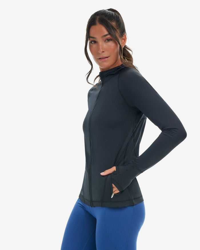 Woman wearing a black hoodie jacket on a white background