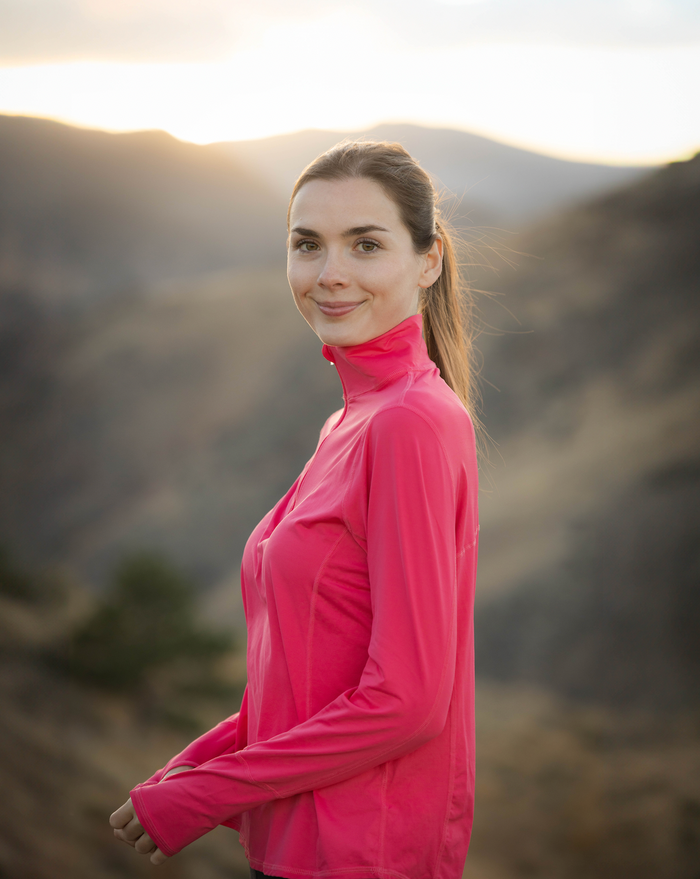 Women wearing watermelon relaxed mock zip top with black leggings. (Style 3002) - BloqUV