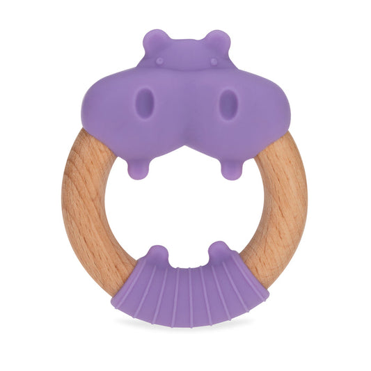 The Wood and Silicone Natural Teether Loop features a round wooden ring and a purple silicone hippo face with fins. Textured surfaces on the wood and silicone soothe tender gums, offering comfort while chewing.